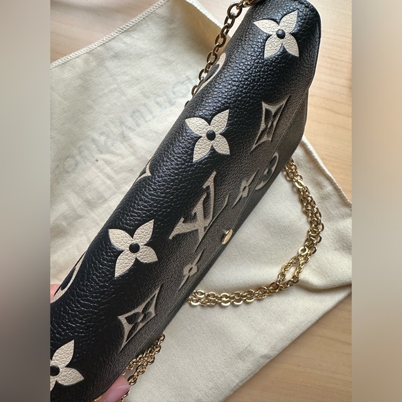 Louis Vuitton
Bicolor Monogram Empreinte Felicie Pochette Bag - Picture 8 of 16